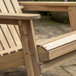 Lounge chair with footstool made from acacia wood