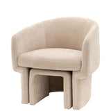 Cream retro chair with footstool.  Curved back.