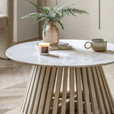 Round coffee table with marble top and wooden base