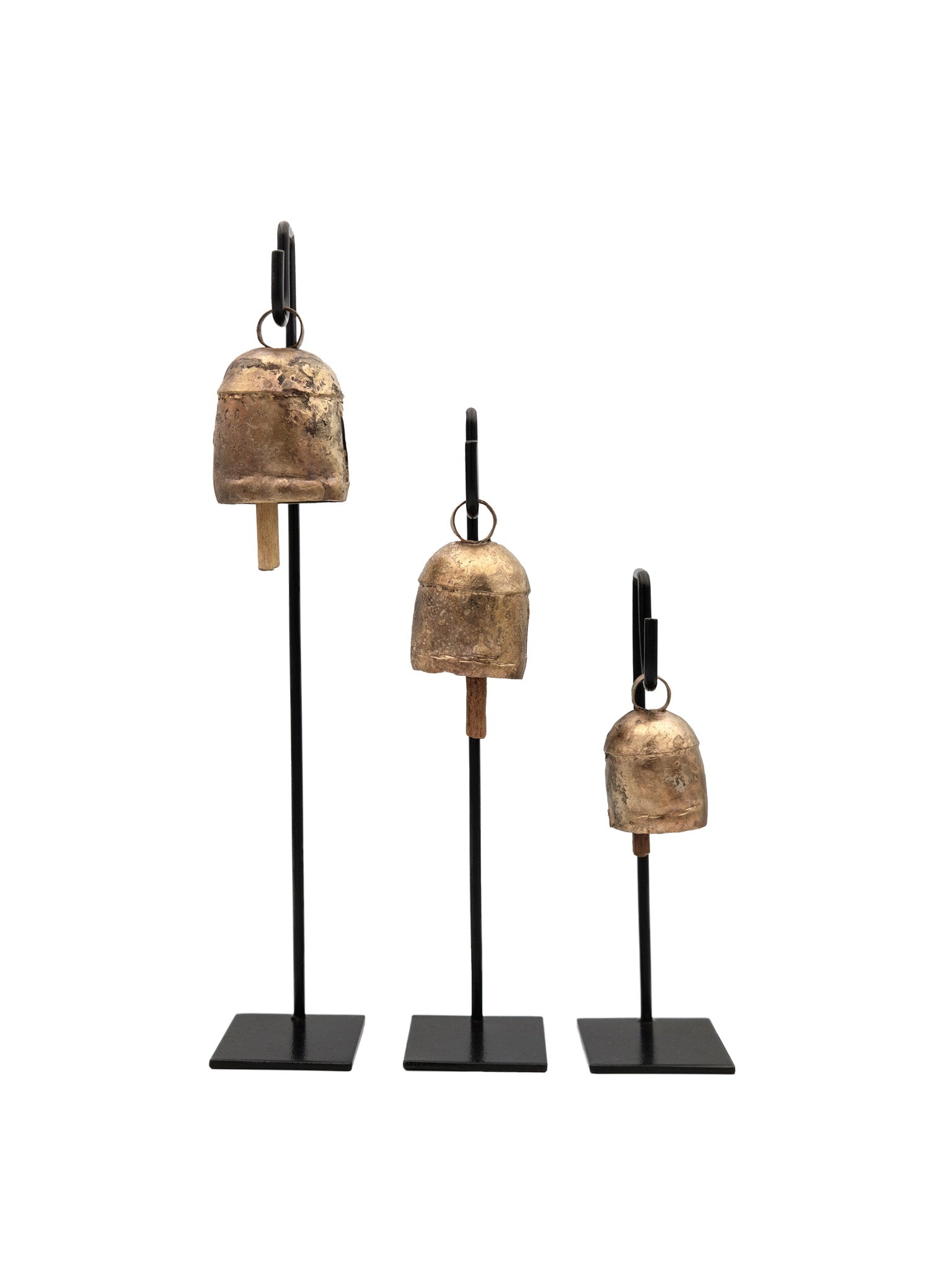 cow bells on a black metal stand set of 3