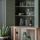 Farmhouse style oak painted cabinet in moss
