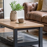 Farmhouse style oak top coffee table painted in meteor