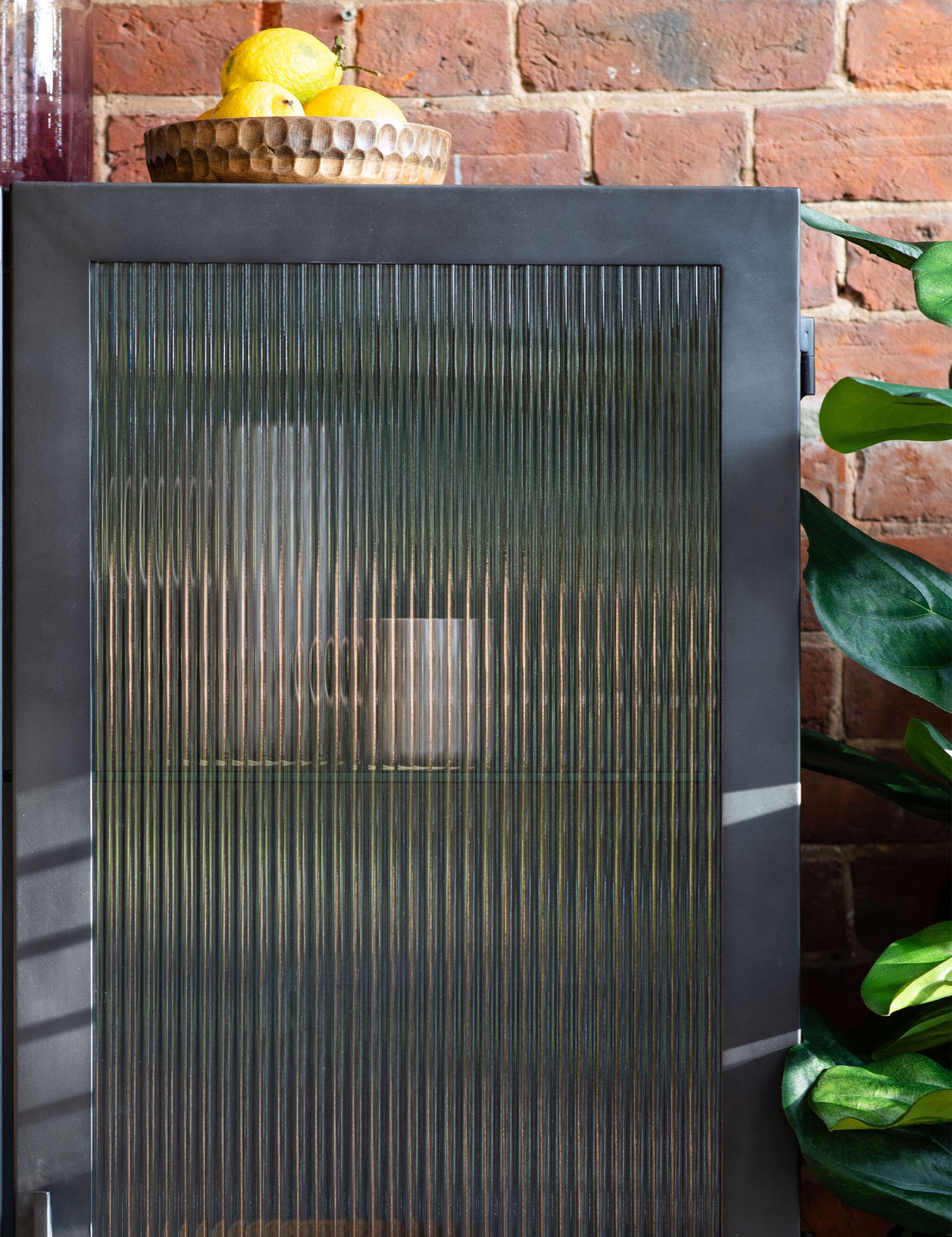 grey metal, glass front cabinet