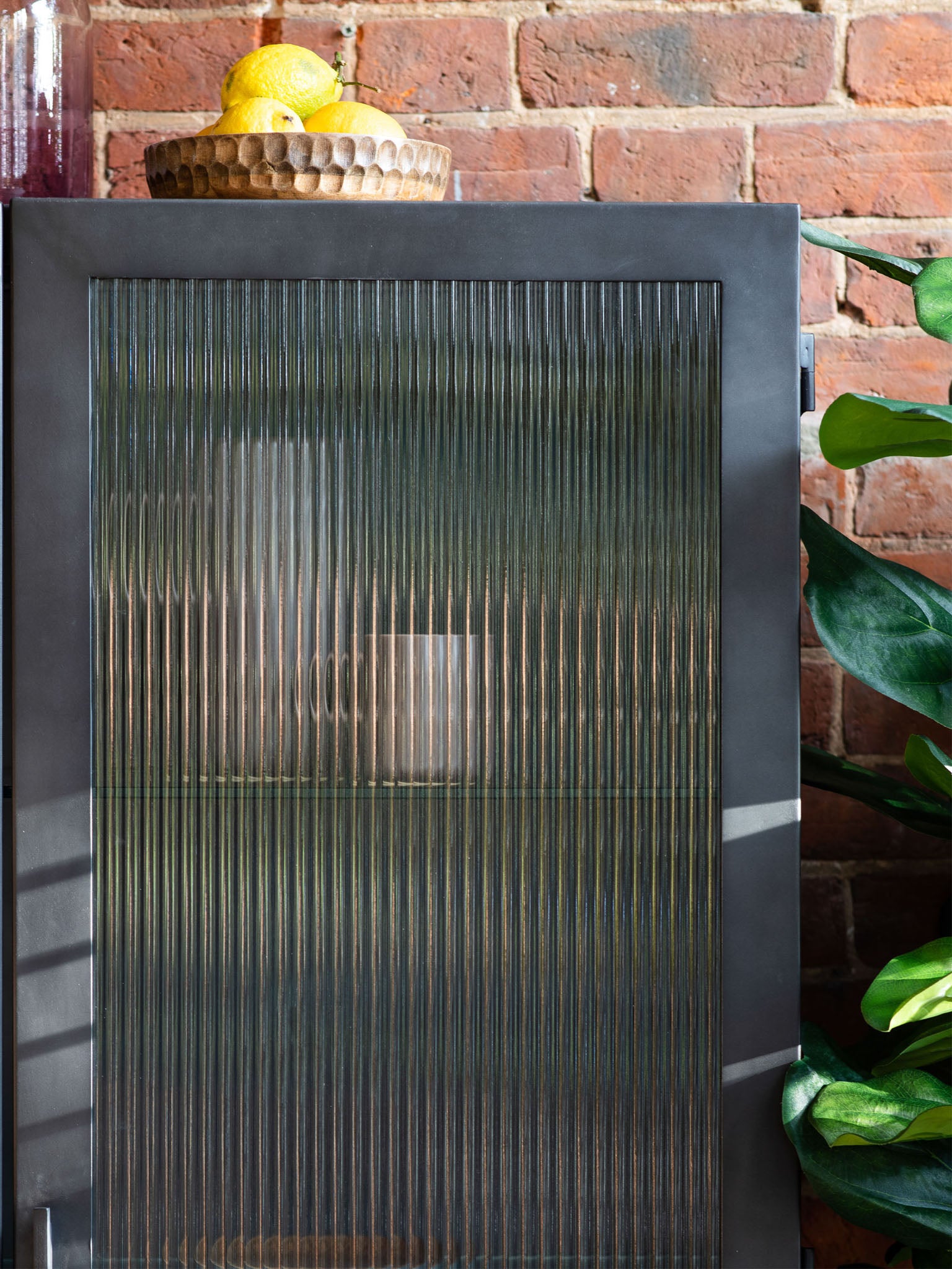 grey metal, glass front cabinet