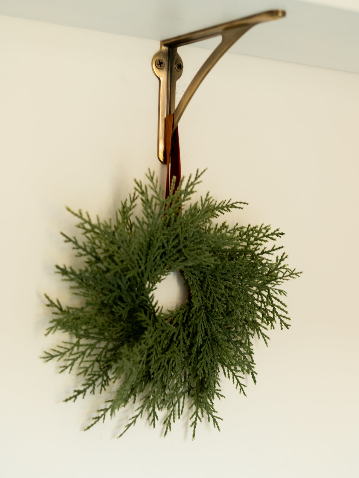 Artificial wreath hanging 