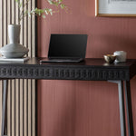 Black two drawer desk with patterned frieze