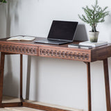 Brown two drawer desk with patterned frieze