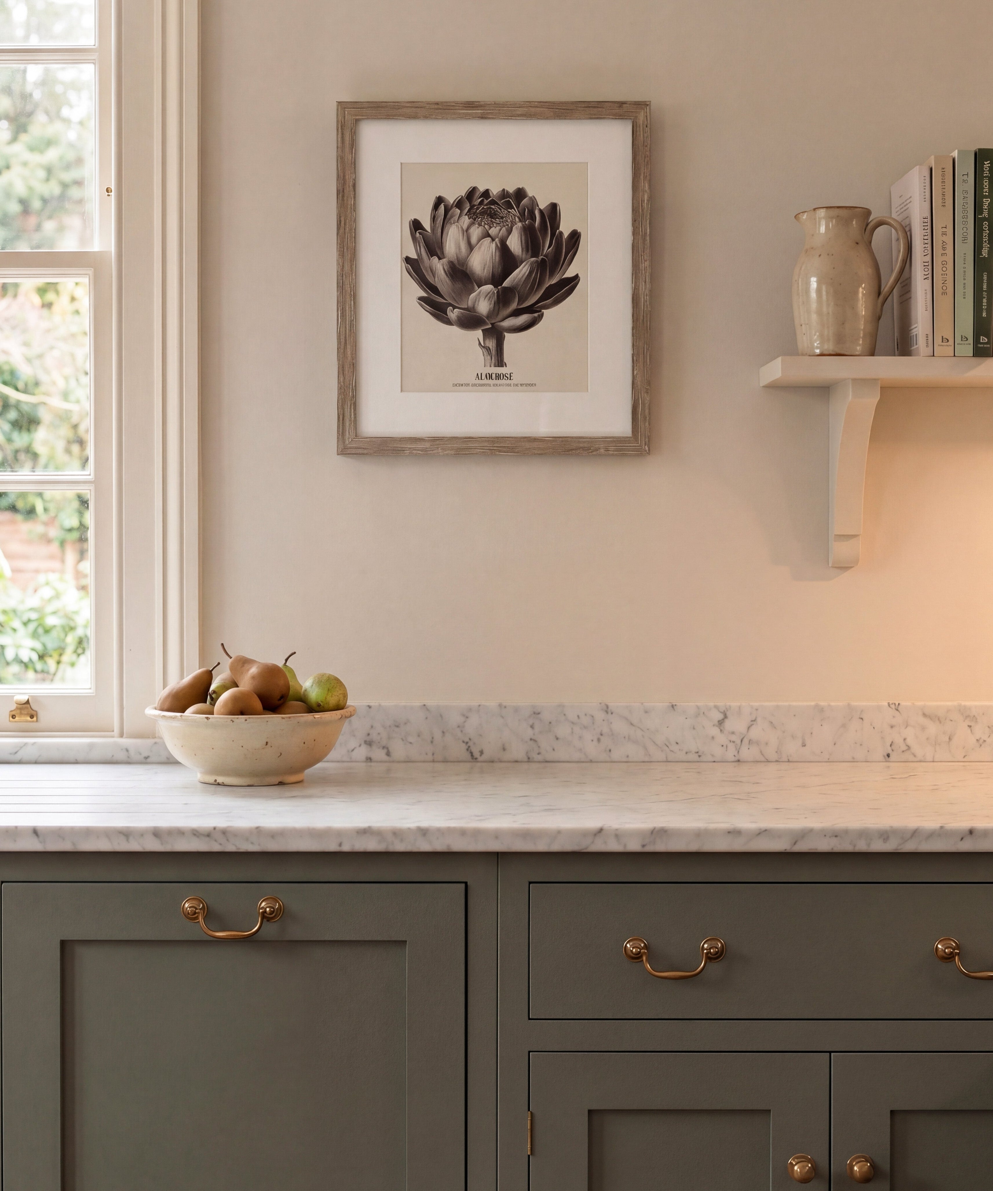 Kitchen interior with gray cabinets, marble countertop, and framed artwork on the wall.