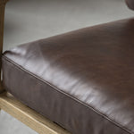 Brown armchair in Antique Brown Leather with wooden arms