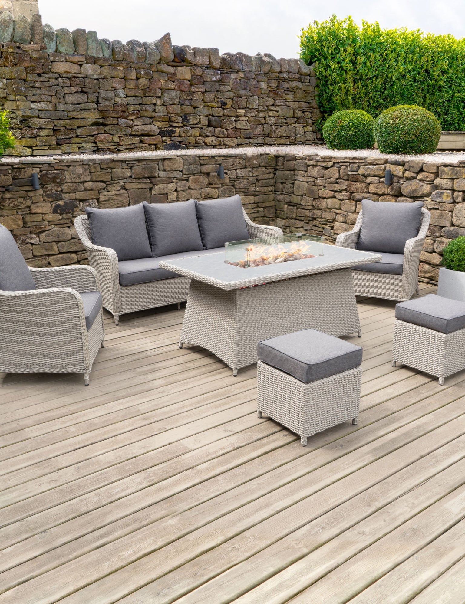 Dining outdoor furniture set is made from a UV protected, weatherproof, synthetic rattan