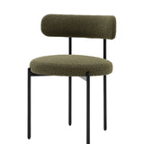Green upholdetered dining chair with black metal legs
