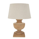 wooden turned lamp with pale linen shade