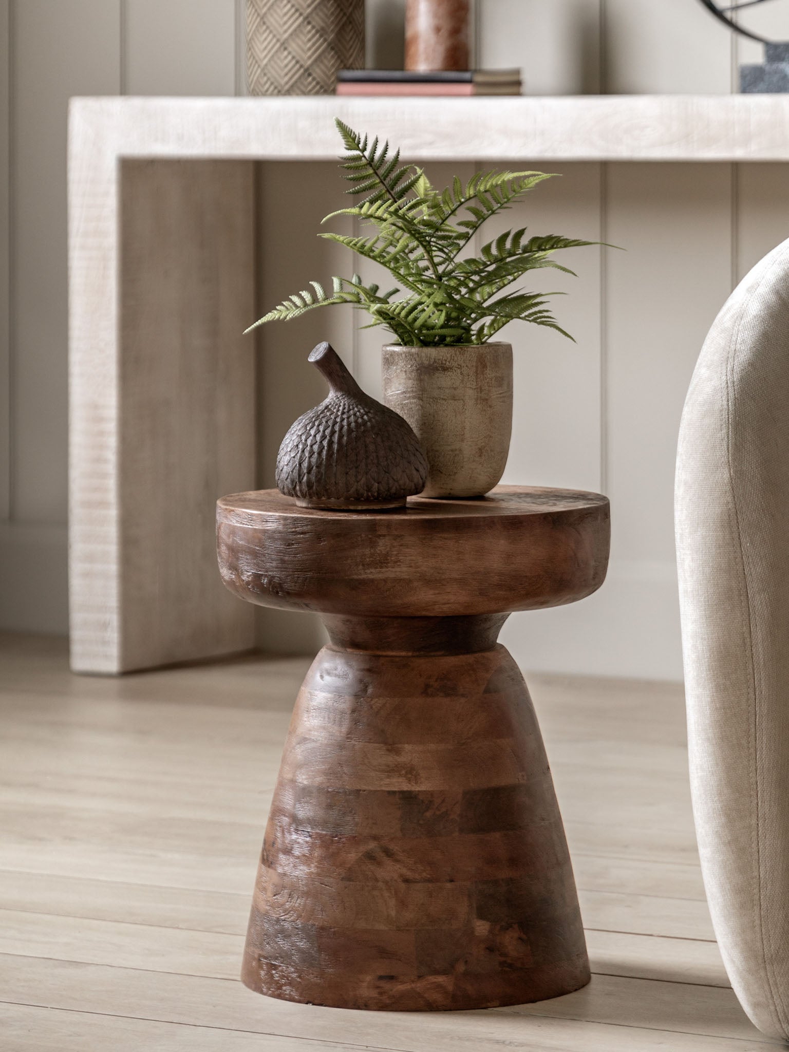 Brown drum shape table in mango wood