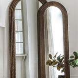 Natural wood grain mirror with curved top