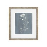 Framed botanical art print featuring delicate white wildflower stems on a textured slate blue background, enclosed in a white mat and a rustic light brown wood frame.