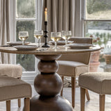 Travertine top round dining table