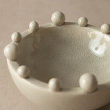 eramic bowl with bobbles