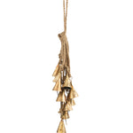 Decorative hanging gold bell ornament on a white background