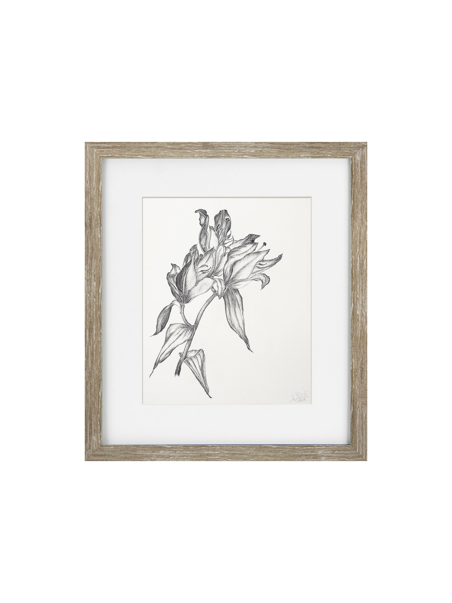 black and white floral print framed in an oak frame