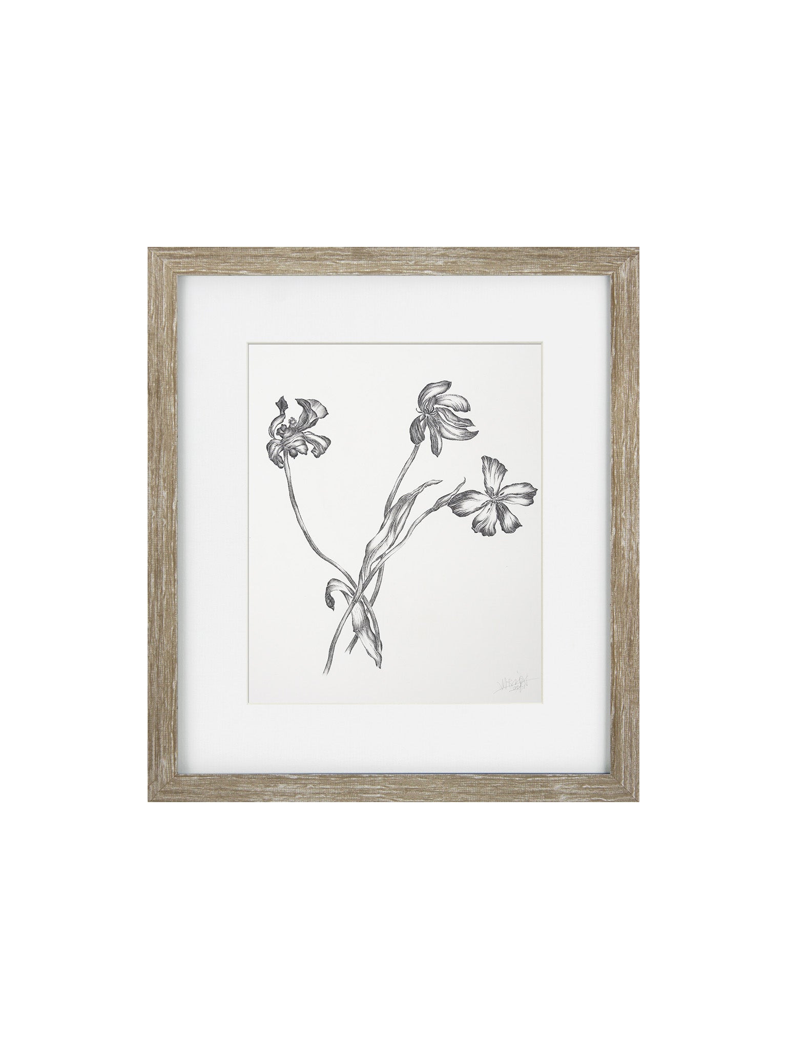 framed black and white floral print in a oak frame