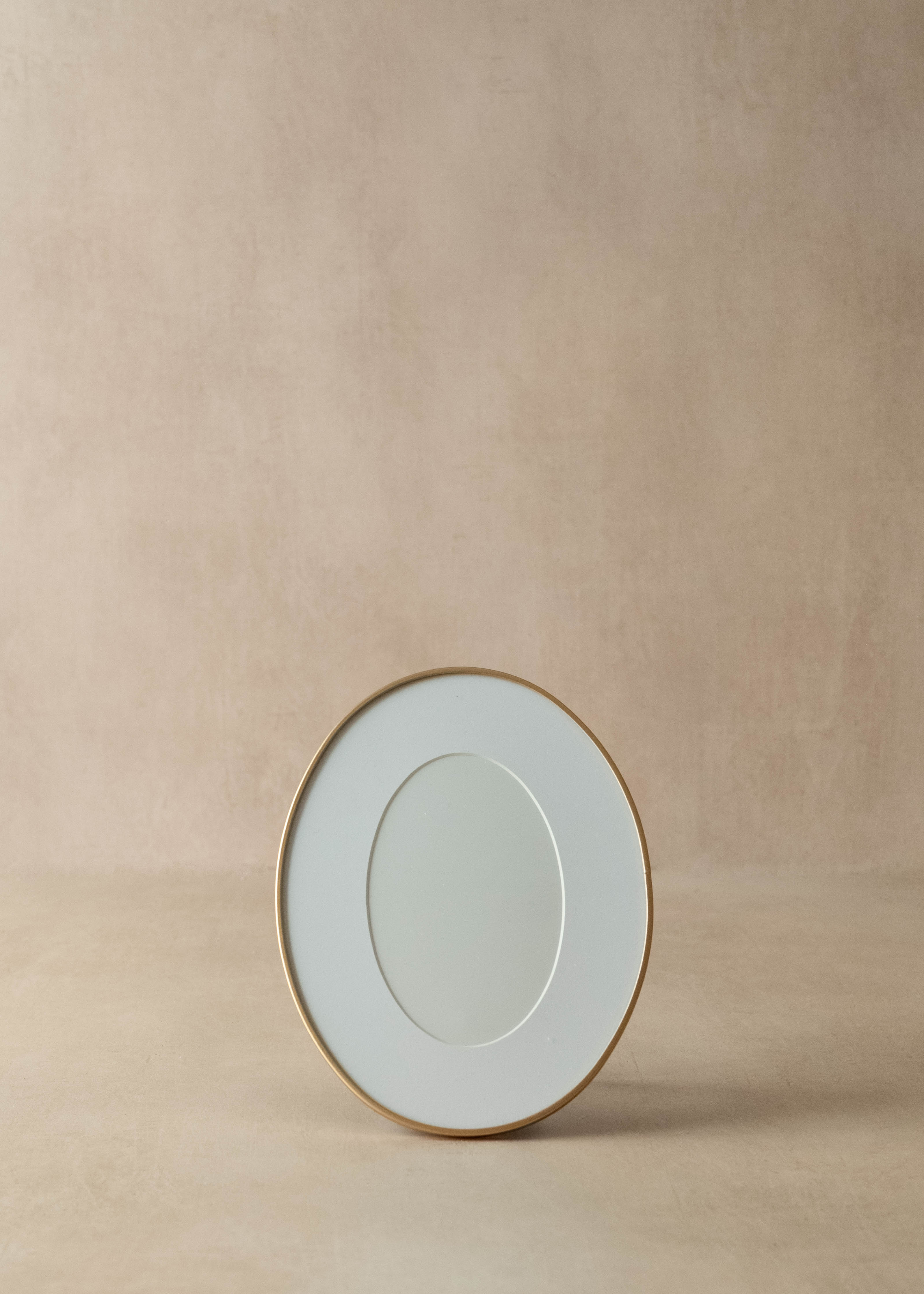 Oval gold photo frame 