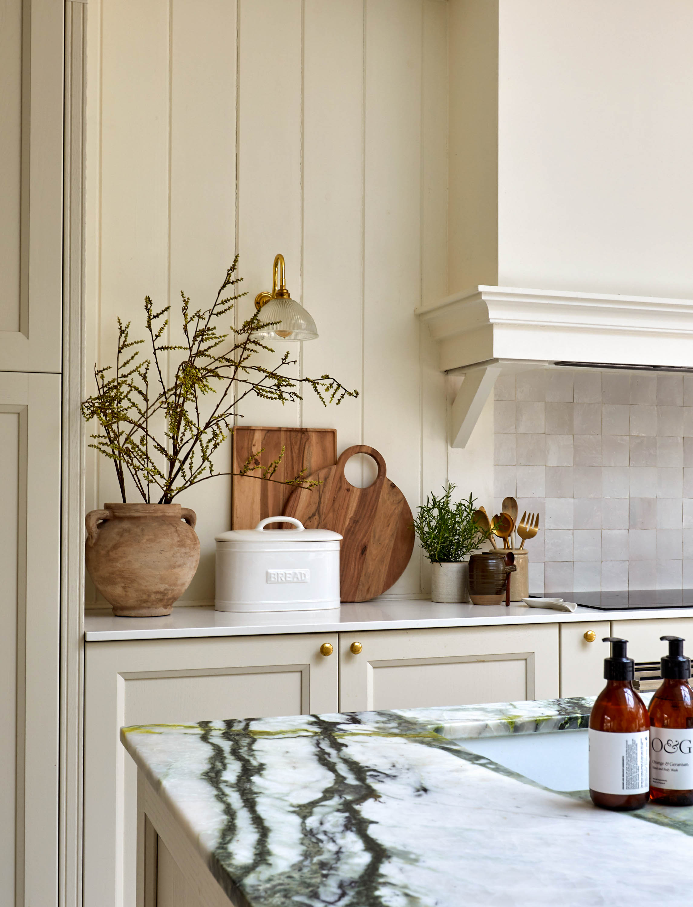 cream kitchen with marble worktops