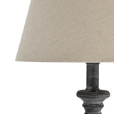 wooden turned in whitewash black  table lamp complete with linen shade.