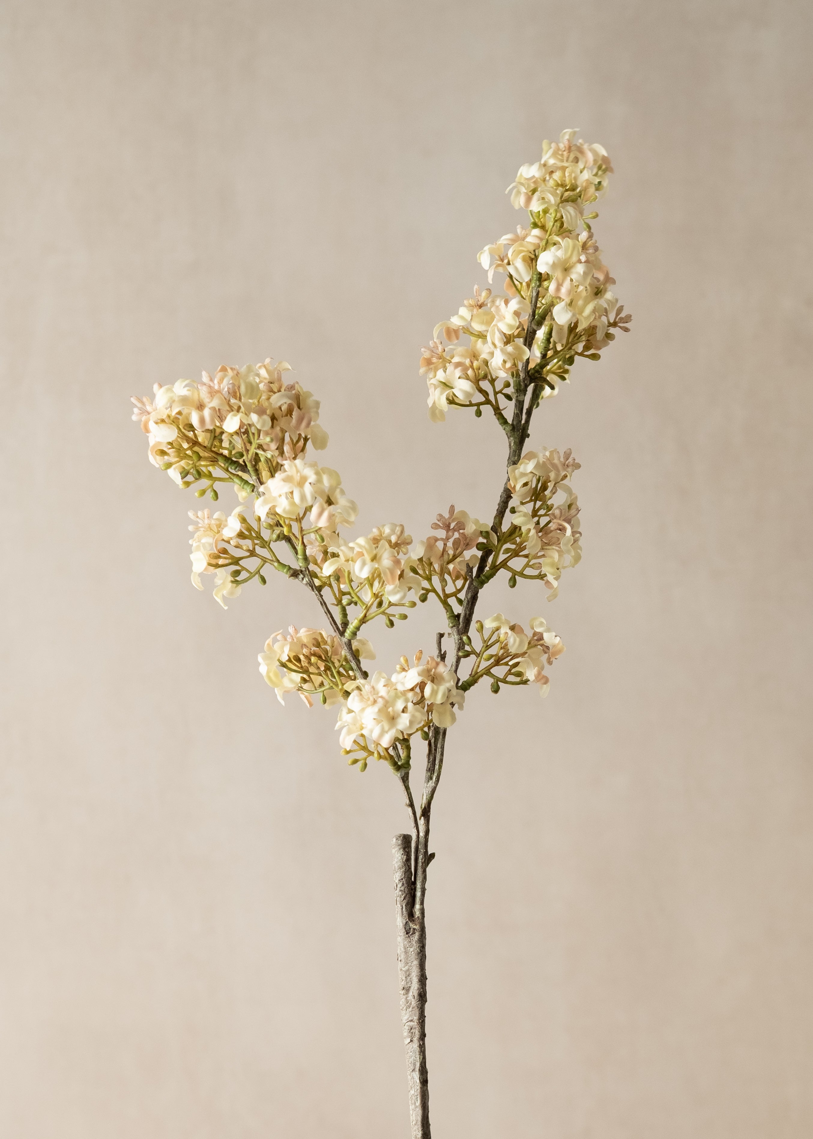 Artificial blush lilac flower