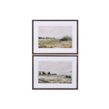 Two framed landscape prints on a white background