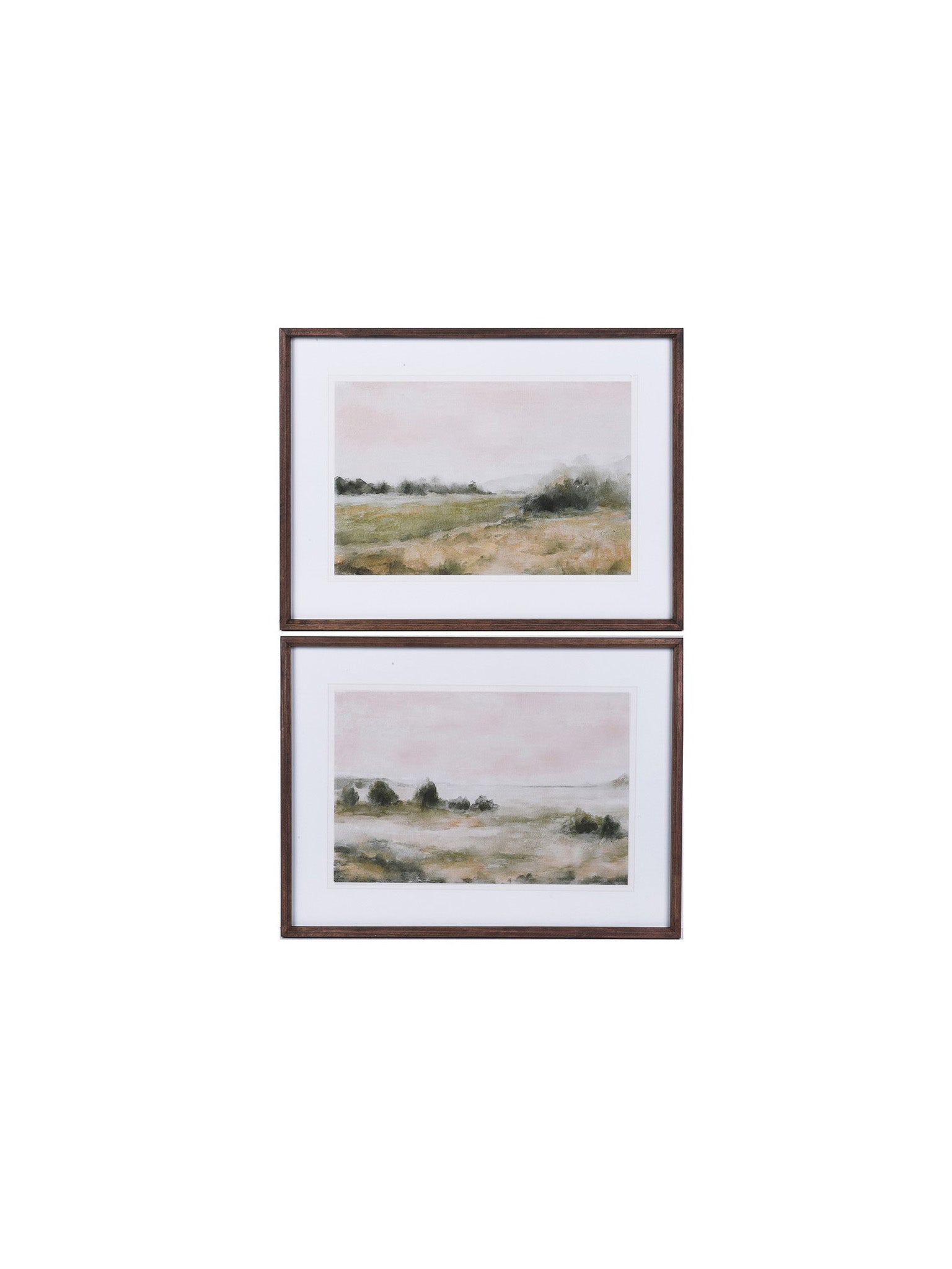 Two framed landscape prints on a white background