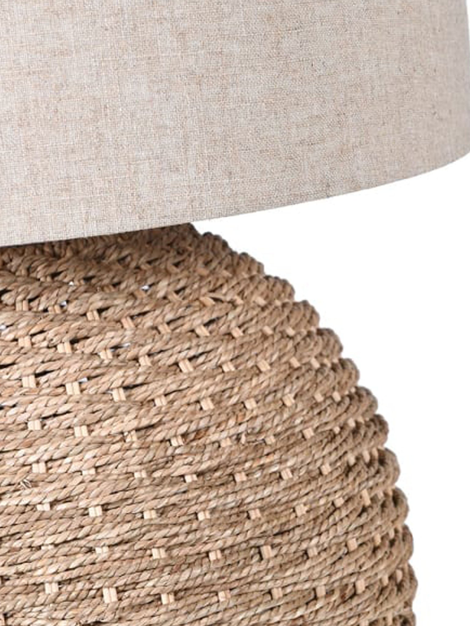 rattan lamp base and linen cylinder shade