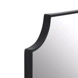 Black frame wall mirror, rectangular shape with inverted corners.