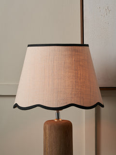 cream/ pink shade on a grey background