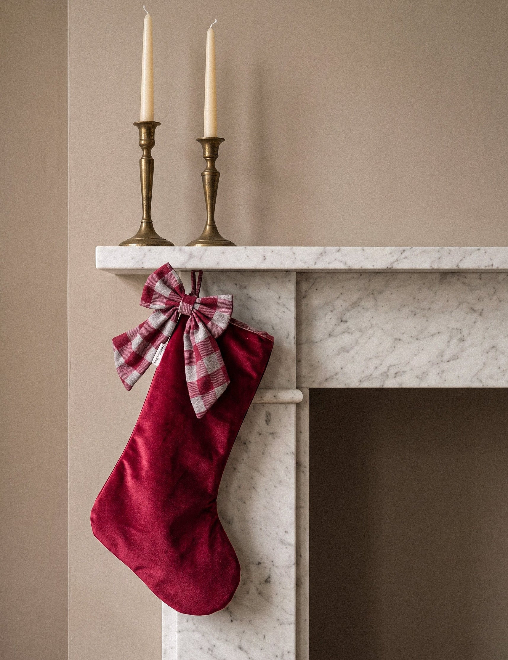red velvet stocking with gingham bow