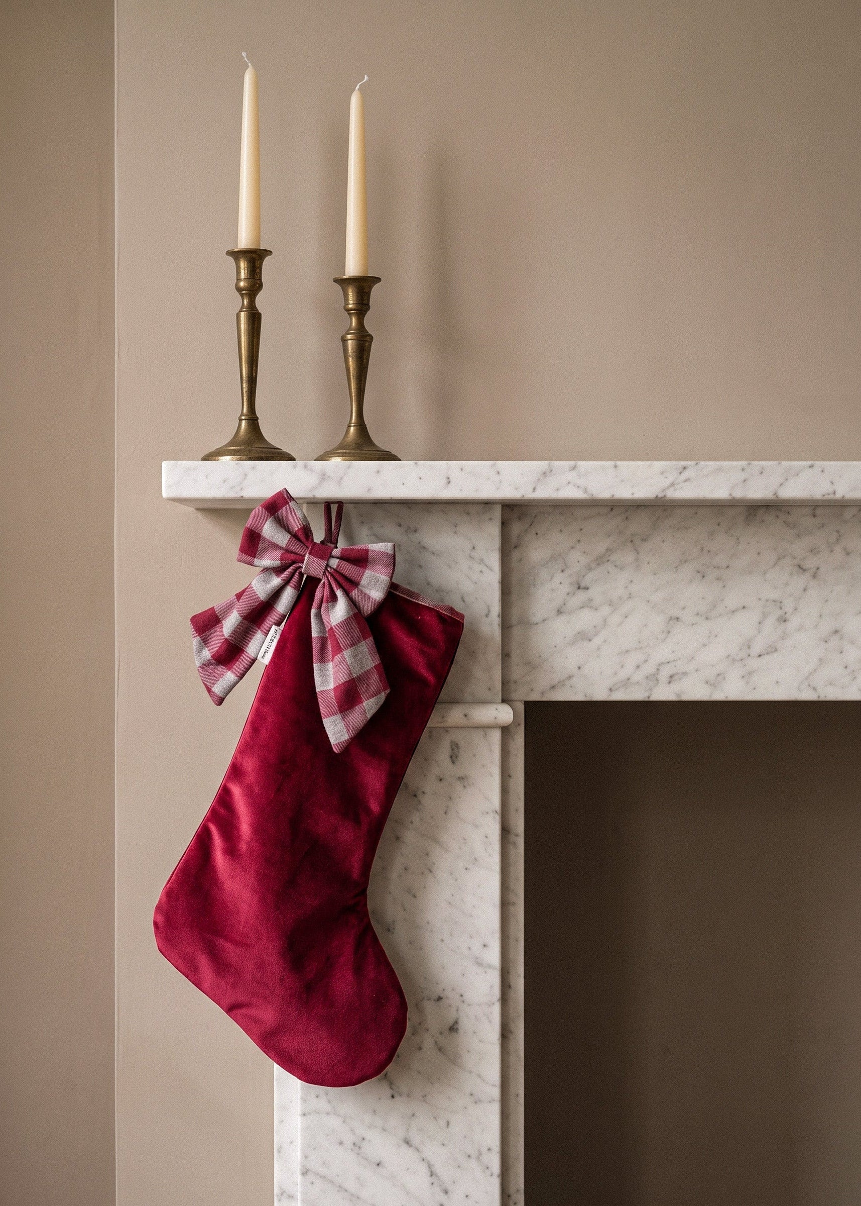 red velvet stocking with gingham bow