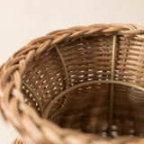 Close-up of a woven basket with a neutral background