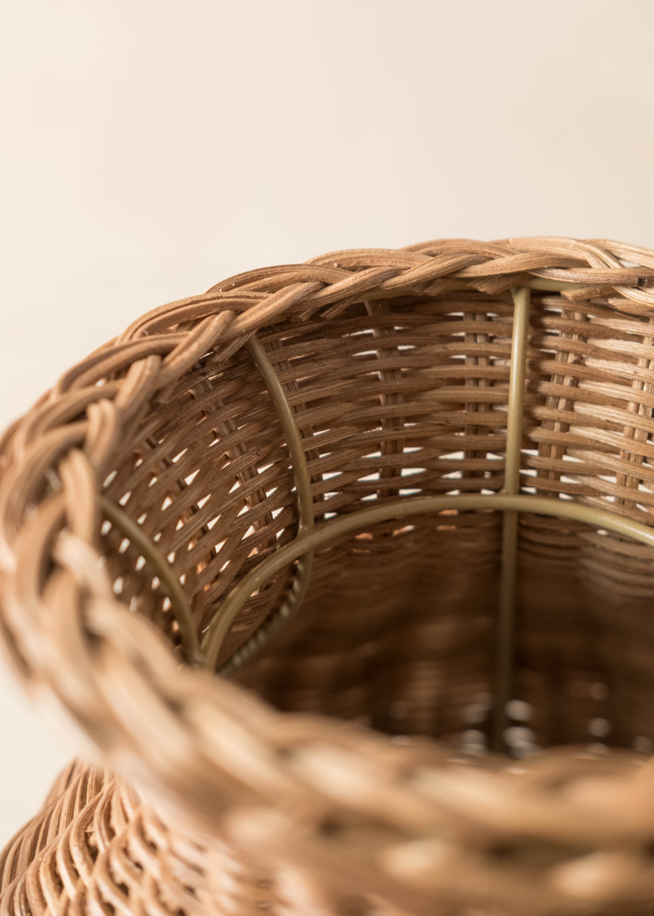 Close-up of a woven basket with a neutral background