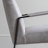 white fabric, metal frame armchair