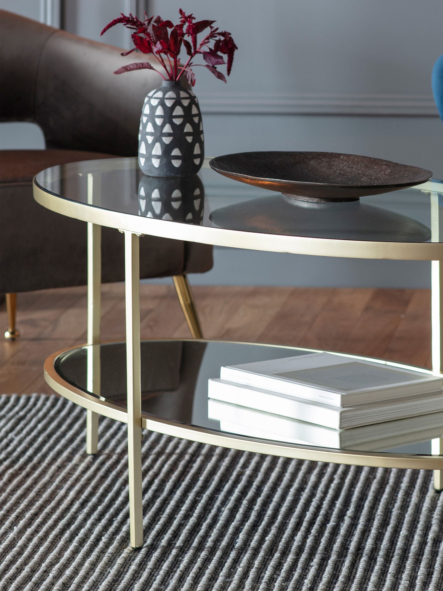 champagne colour, oval glass coffee table