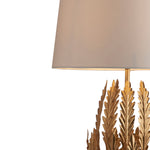 gold leaf table lamp with white shade