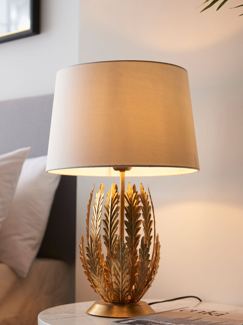 gold leaf table lamp with white shade