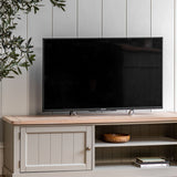 farmhouse style oak top media unit painted in olive green