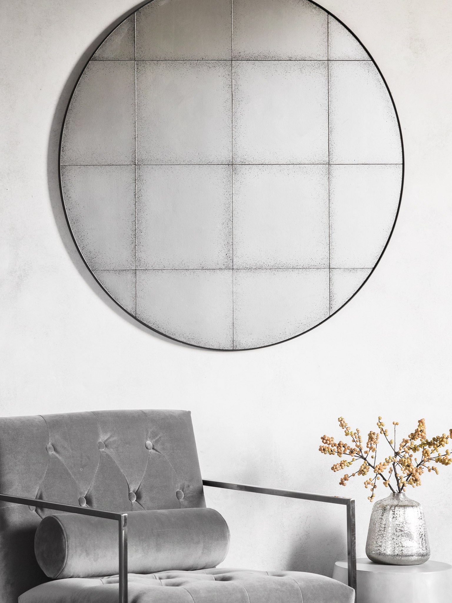 round antiqued grid mirror