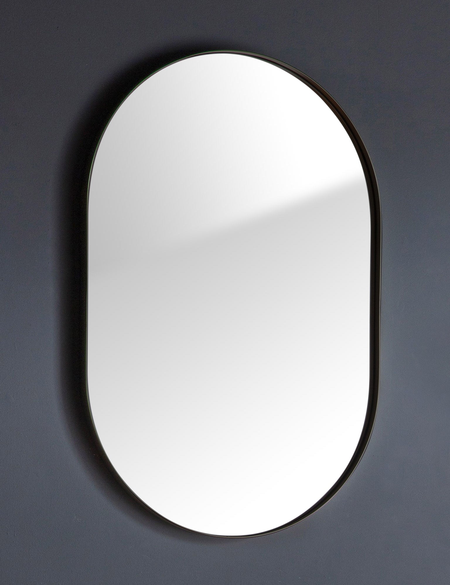black oval mirror