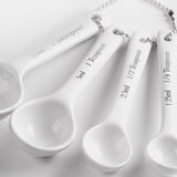 four measuring spoons ranging from a quater tea spoon to one tablespoon 